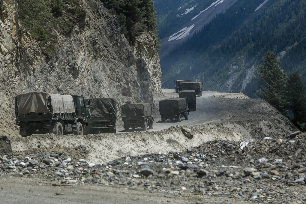 An Indian Army convoy carrying reinforcements and supplies travels towards Leh through Zoji La, a high mountain pass bordering China in Ladakh, India, in June 2021. Photo: TNS