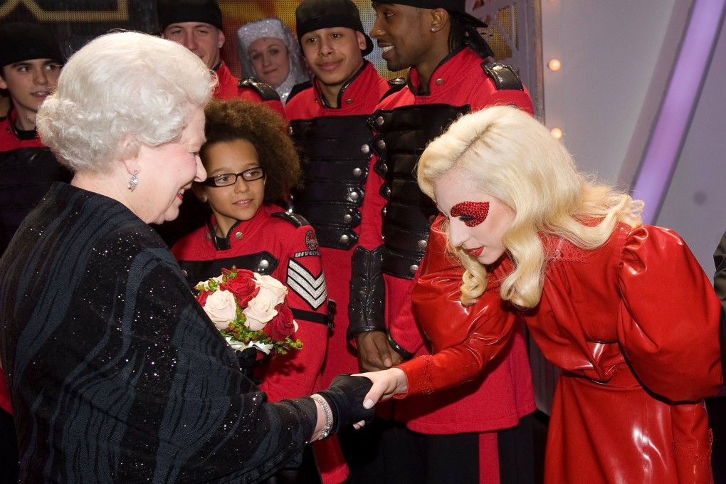 Britain’s Queen Elizabeth meeting American singer Lady Gaga in 2009. File photo: AFP