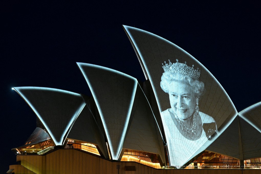 An image of the late Queen Elizabeth is illuminated on one of the sails of the Sydney Opera House. Photo: Reuters