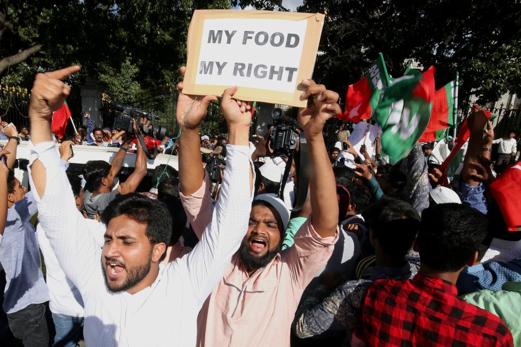 A protest against India’s decision to ban the purchase and sale of cattle from animal markets for slaughter in Bangalore, India in 2017. Photo: EPA