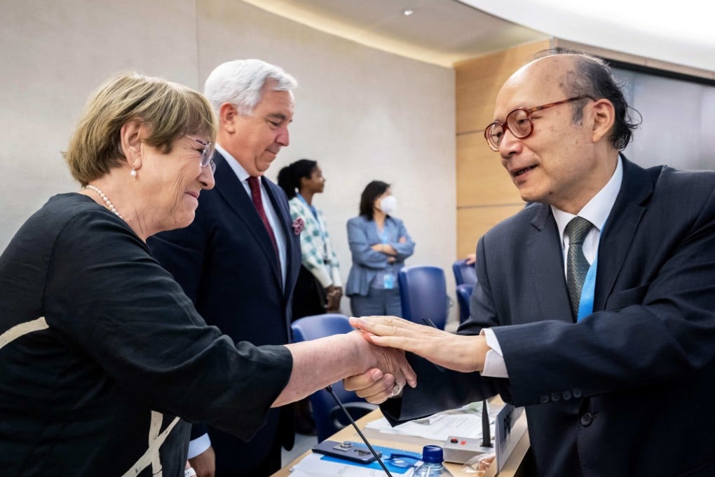 Outgoing UN human rights chief Michelle Bachelet is greeted by Chen Xu, China’s ambassador to the UN in Geneva, on August 30. Photo: AFP