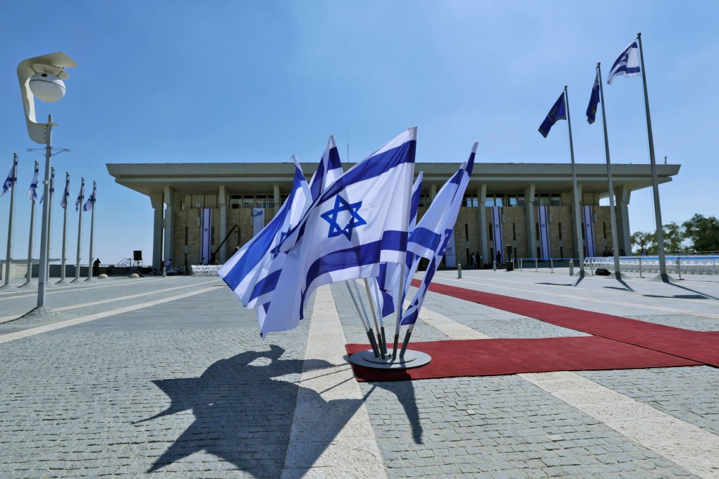 Israeli flags flying outside the Knesset (Israeli parliament) in Jerusalem. Photo: AFP
