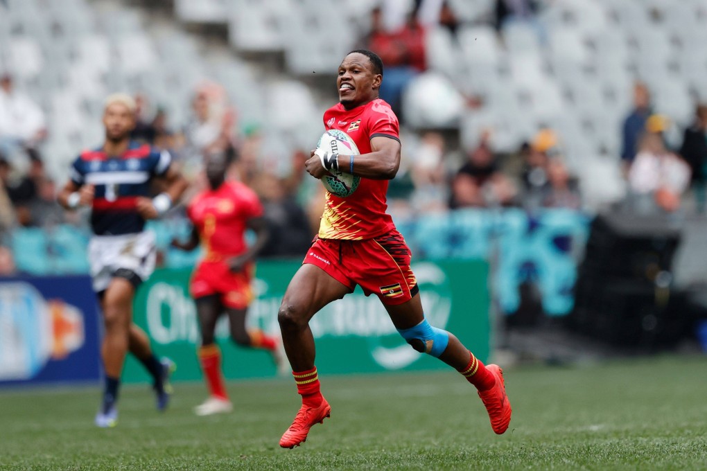 Uganda’s Adrian Kasito races away from the Hong Kong defence at the Rugby World Cup Sevens in Cape Town. Photo: Mike Lee - KLC fotos for World Rugby