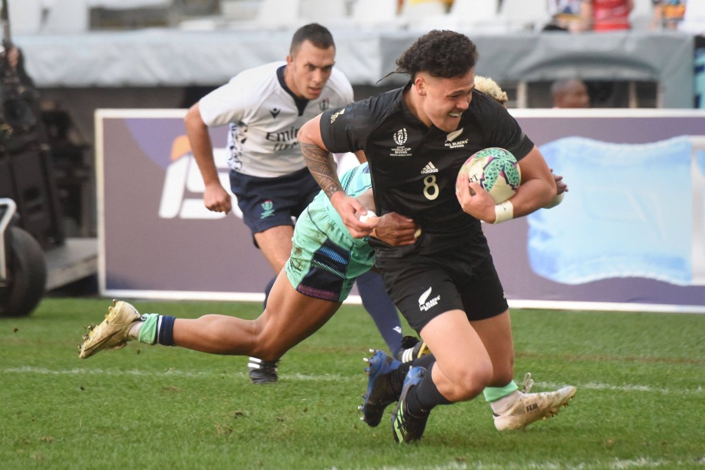 Caleb Tangitau of New Zealand scores a try against Scotland at the Rugby World Cup Sevens in Cape Town. Photo: AFP