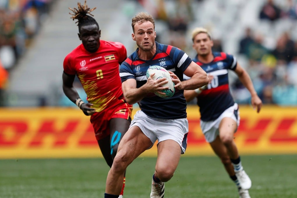 Hong Kong’s Harry Sayers attacks the Uganda defence on day two of the Rugby World Cup Sevens in Cape Town. Photo: Mike Lee/KLC fotos for World Rugby