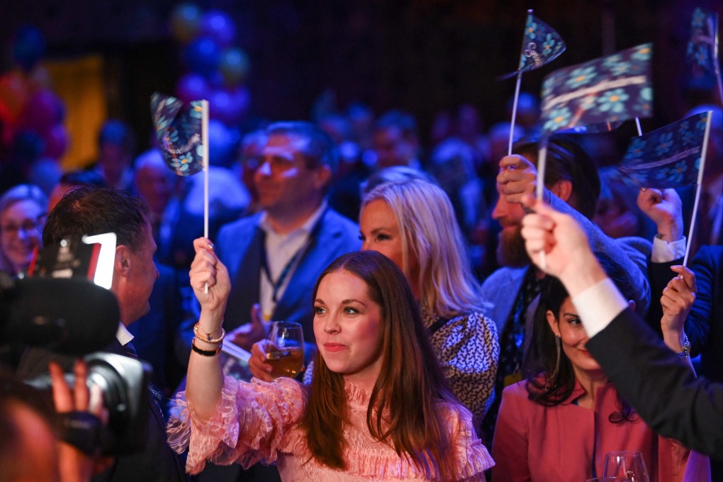 Supporters of the Sweden Democrats cheer during the Party’s election night in Nacka, near Stockholm, Sweden on Sunday. Photo: AFP