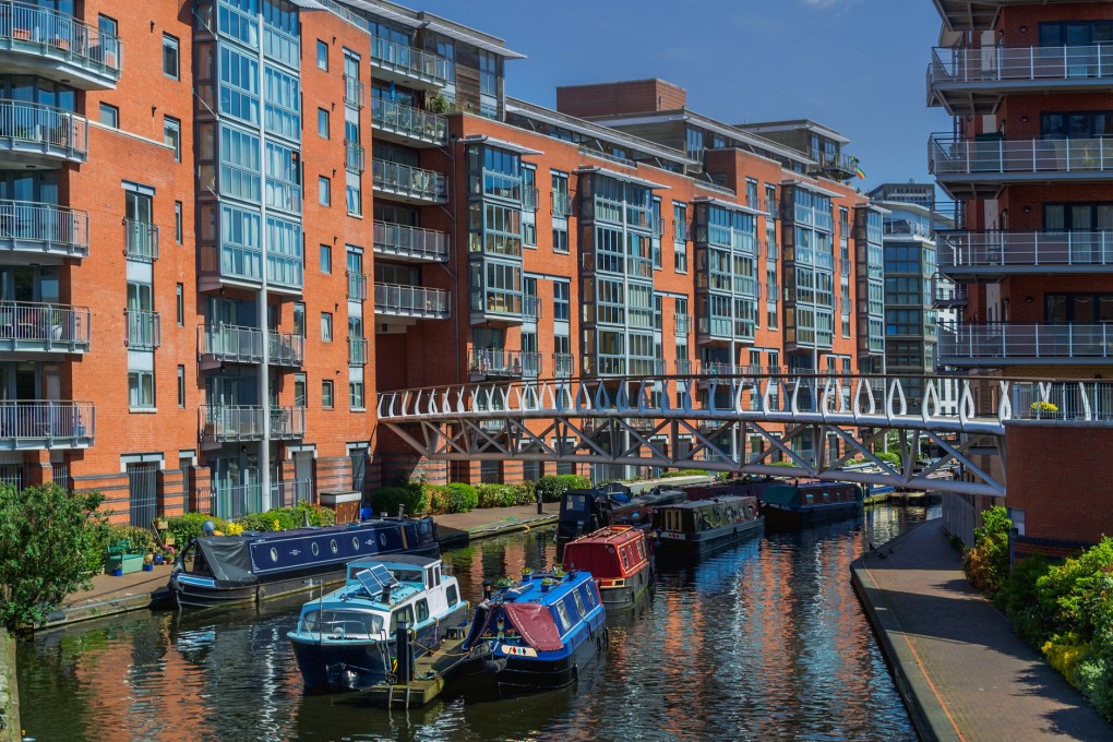 Apartments alongside the canal in the city centre of Birmingham. The rapidly weakening pound and the Hong Kong dollar’s recent strength have made Britain an increasingly attractive place for Hongkongers looking to invest overseas. Photo: Getty Images