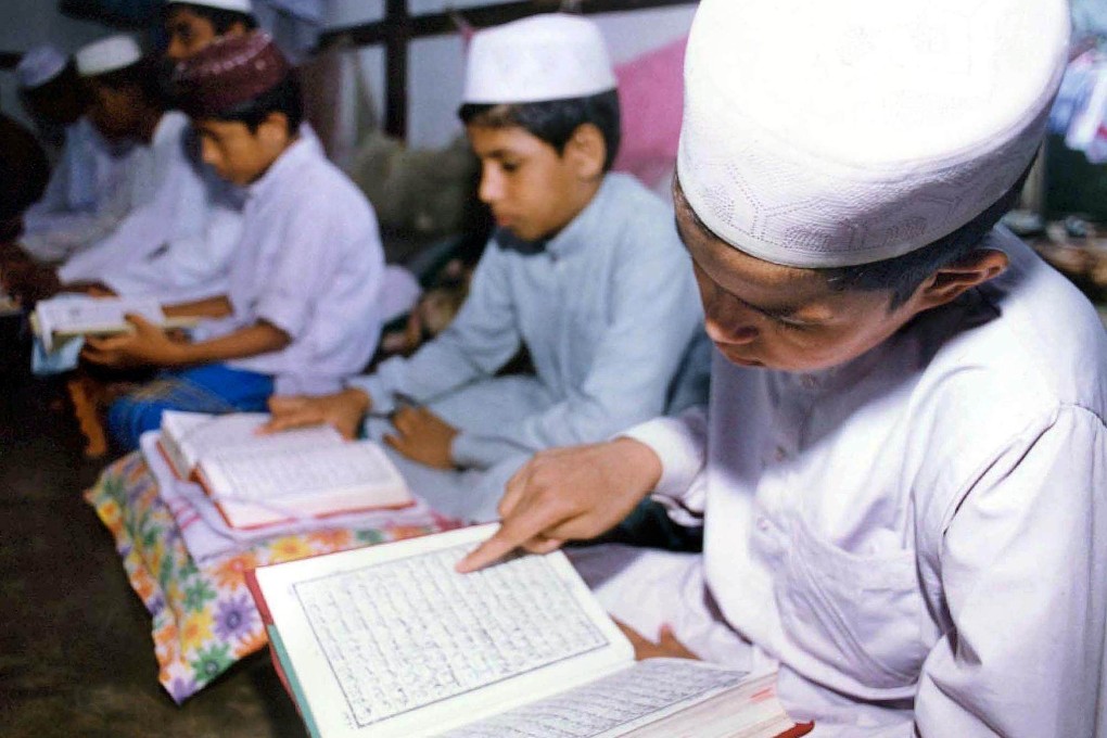 Students at a madrasa in India. File photo: AFP