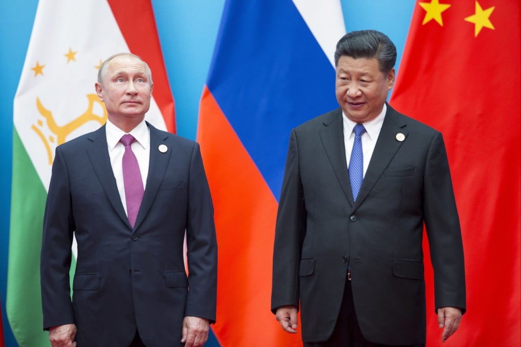 Chinese President Xi Jinping and Russian President Vladimir Putin meet at the Shanghai Cooperation Organization (SCO) Summit in Qingdao on June 10, 2018. Xi is using his first trip abroad since the start of the pandemic to promote China’s strategic ambitions at this year’s summit of the Central Asian security group. Photo: AP