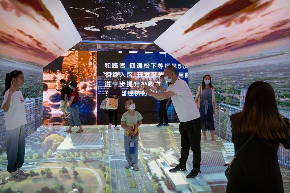 Visitors walk through the Beijing E-town Metaverse Experience display at the China International Fair for Trade in Services on September 3. Photo: AP