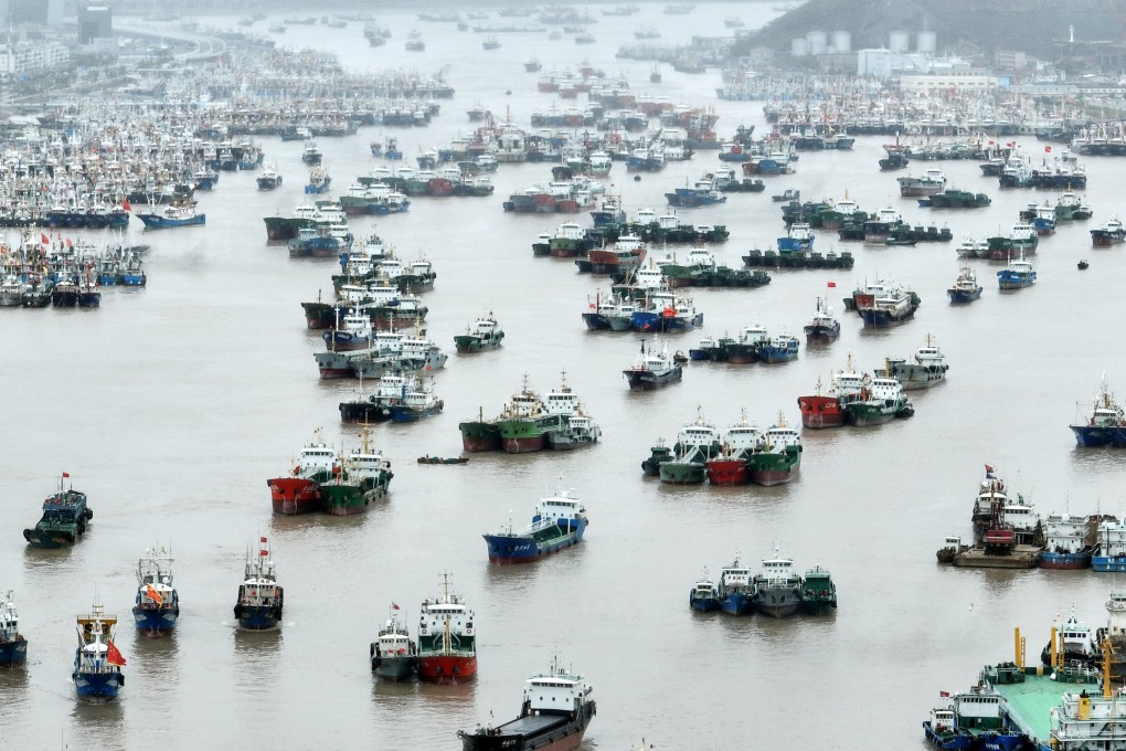 Vessels moored at a fishing port in Zhejiang province on Tuesday. Much of the region had been shut down as Typhoon Muifa approached. Photo: Reuters