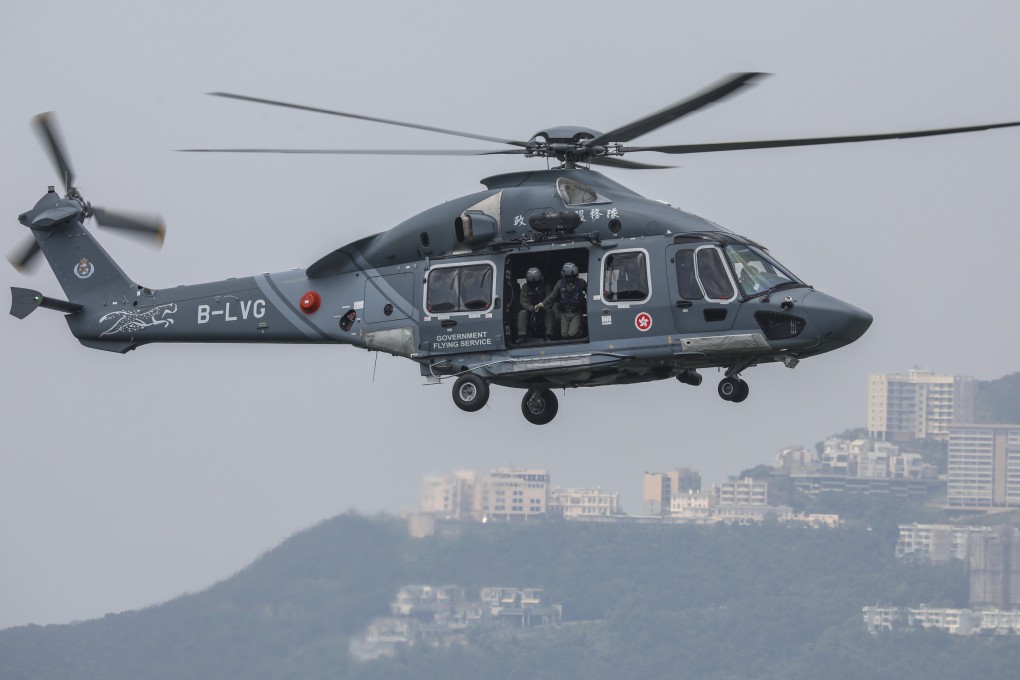 A government helicopter in action. A similar type has been deployed on Wednesday as part of a search mission to track down two suspects at sea. Photo: Nora Tam