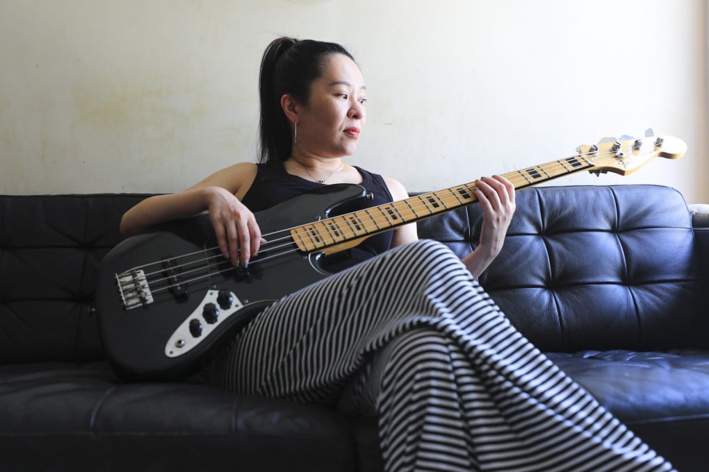 Musician Kylie Chow Kit-yee at her home in the Kowloon neighbourhood of Yau Ma Tei. As Hong Kong’s live-music ban continues, indie musicians are struggling with mental health issues and debt. Photo: Xiaomei Chen