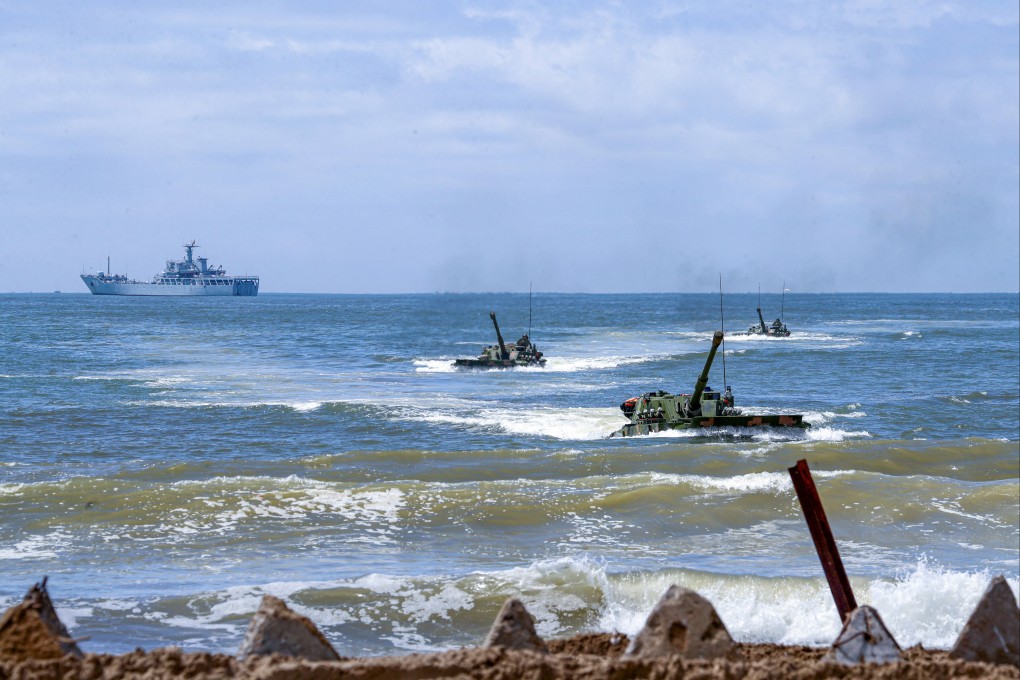 Amphibious armoured vehicles under the People’s Liberation Army Eastern Theatre Command take part in an assault wave formation training exercise in Zhangzhou, Fujian province, last month. Photo: Reuters