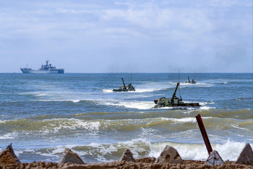 Amphibious armoured vehicles under the People’s Liberation Army Eastern Theatre Command take part in an assault wave formation training exercise in Zhangzhou, Fujian province, last month. Photo: Reuters