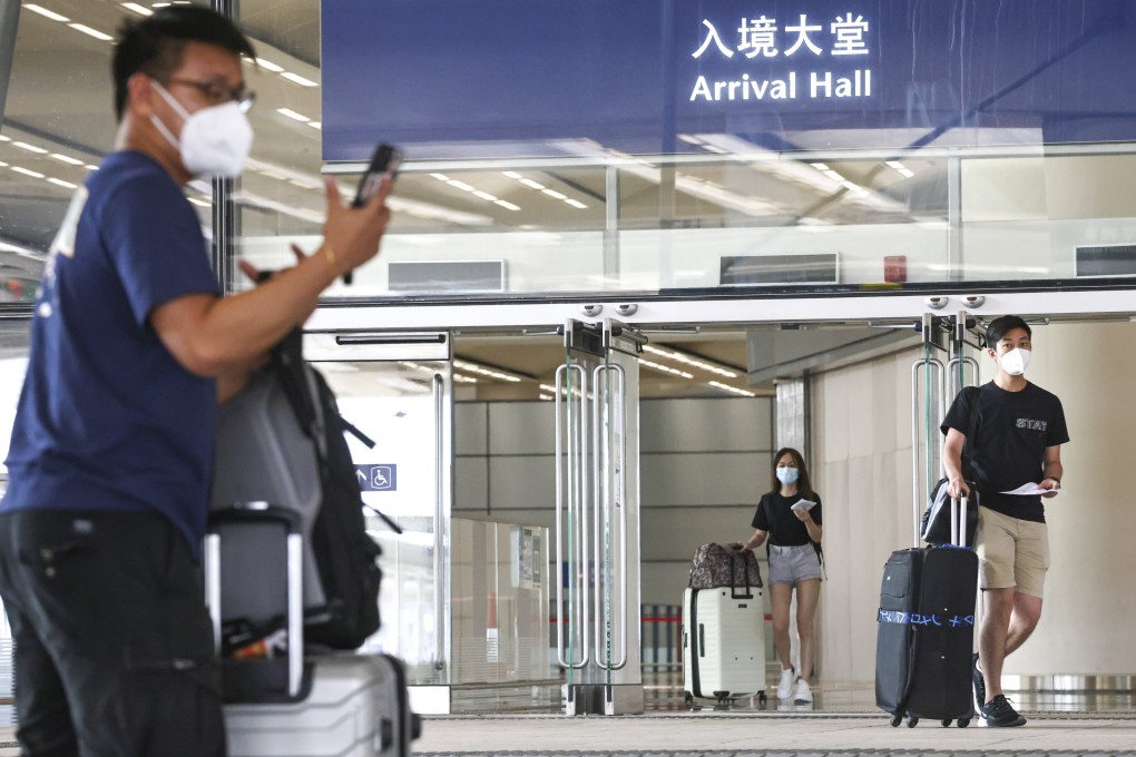Travelers from China arrive at the Hong Kong-Zhuhai-Macao Bridge. Covid exemptions to unvaccinated visitors have raised concerns over Hong Kong’s defence mechanism. Photo: K. Y. Cheng