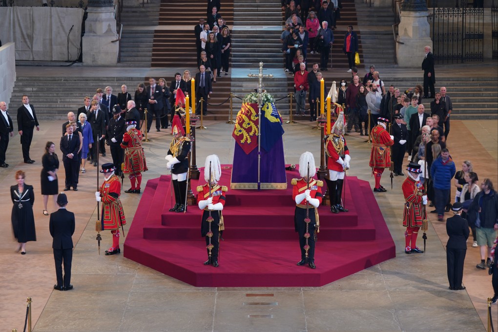 The first members of the public pay their respects on Wednesday as the vigil begins around the coffin of Queen Elizabeth in Westminster Hall, where it will lie in state ahead of her funeral on Monday. Photo: PA Wire via dpa