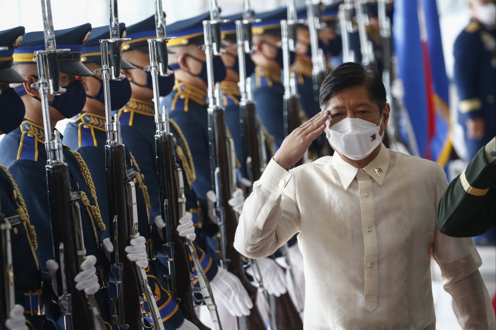 Philippine President Ferdinand Marcos Jnr salutes during departure rites at the Ninoy Aquino International Airport on September 4, 2022. Photo: EPA-EFE