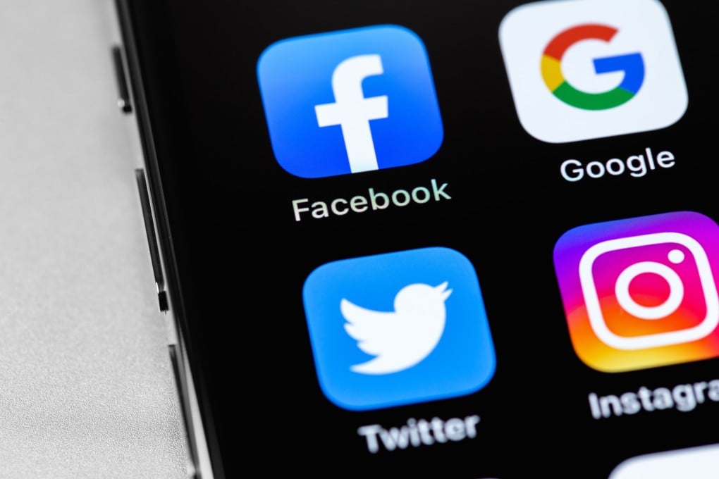 Facebook, Instagram, Google and Twitter mobile app icons on an iPhone screen. Photo: Shutterstock