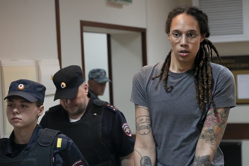 WNBA star Brittney Griner is escorted from a courtroom in Khimki, just outside Moscow, in August. Photo: AP