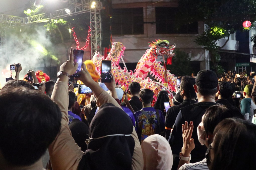 A dragon dance in the Chinatown night market in the Indonesian city of Surabaya. Photo: Johannes Nugroho