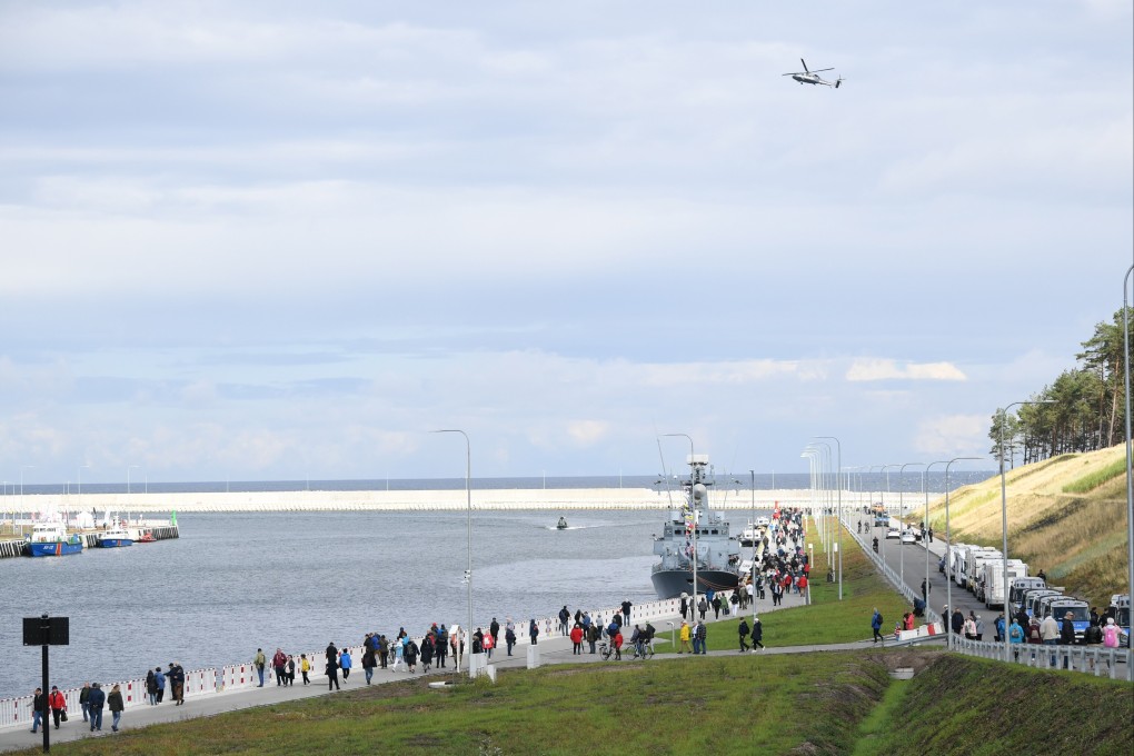 Poland’s top leaders celebrated the opening of a new — albeit unfinished — canal that they say will mean ships no longer must secure Russia’s permission to sail from the Baltic Sea to the ports of the Vistula Lagoon. Photo: EPA-EFE