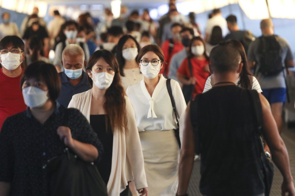 Commuters in Central during rush hour. Land sales have also plummeted, generating only HK$17.2 billion in income for the government in the first five months of the year. Photo: Xiaomei Chen