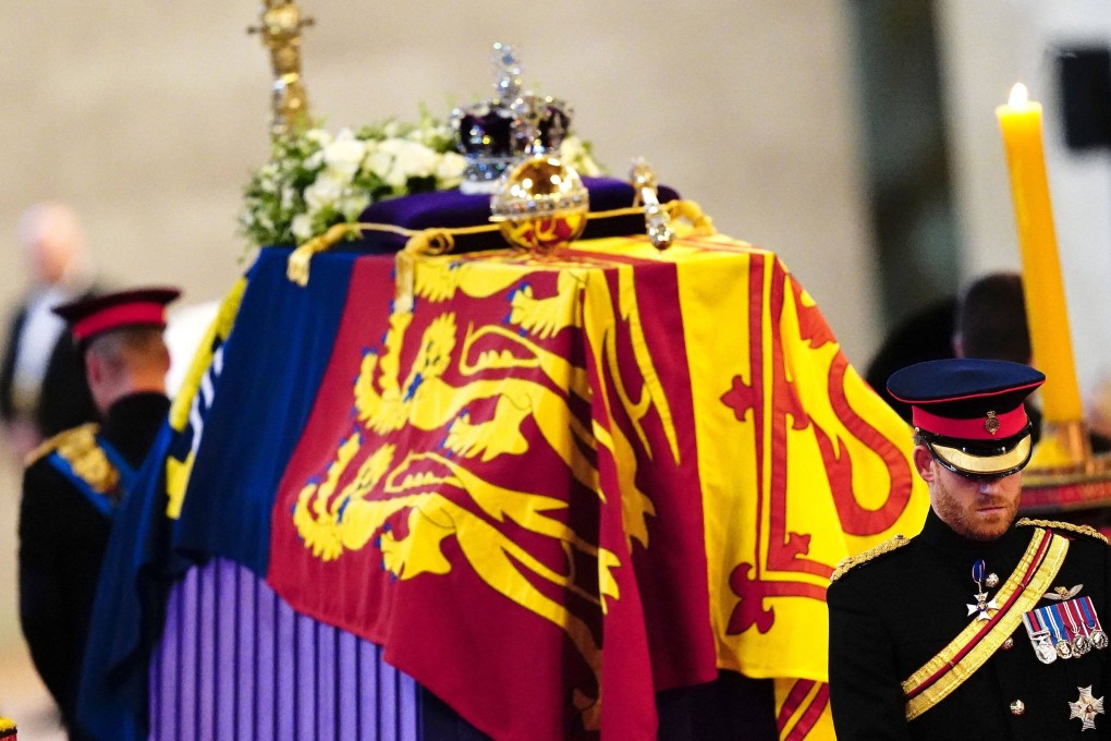 Queen Elizabeth II ‘s grandchildren Britain’s Prince William, Prince of Wales (L) and Britain’s Prince Harry, Duke of Sussex (R) hold a vigil at the coffin of Queen Elizabeth II, lying in state on the catafalque in Westminster Hall on Saturday. Photo: Pool/AFP