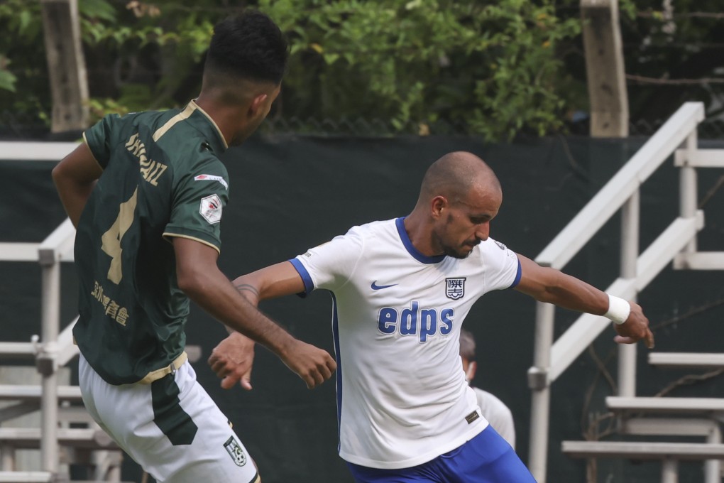 Kitchee’s Mikael Servero Burkatt (right) takes the ball past Sham Shui Po’s Shahwaiz Khan during their Hong Kong Premier League clash at Shui Shui Po Sports Ground. Photo: Edmond So