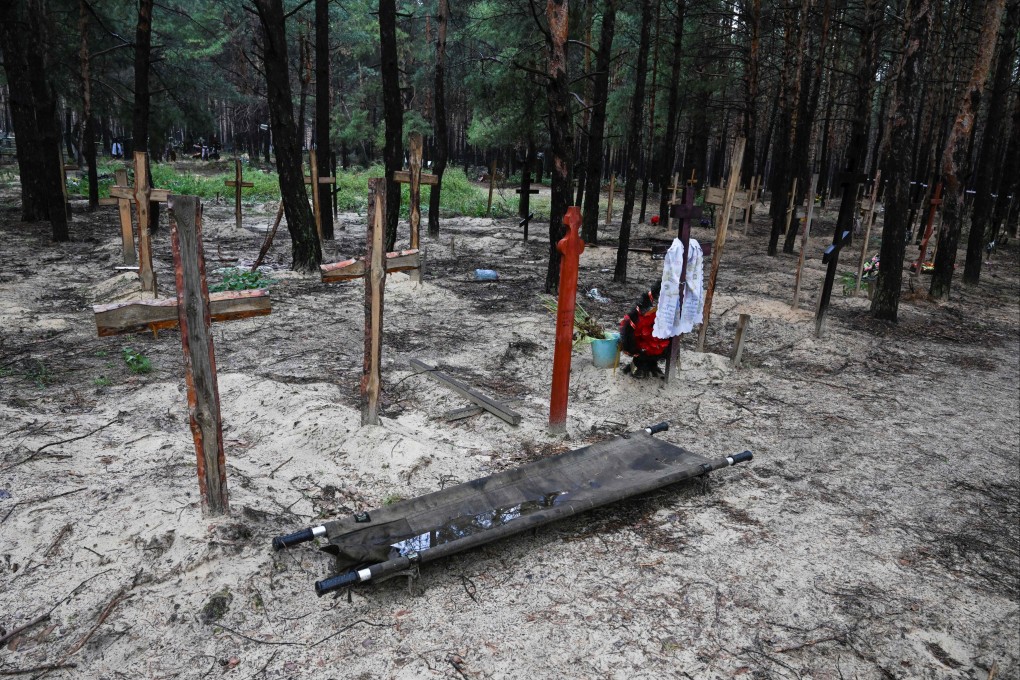 Ukraine said it had counted 450 graves at just one burial site near Izyum after recapturing the eastern city from the Russians. Photo: AFP