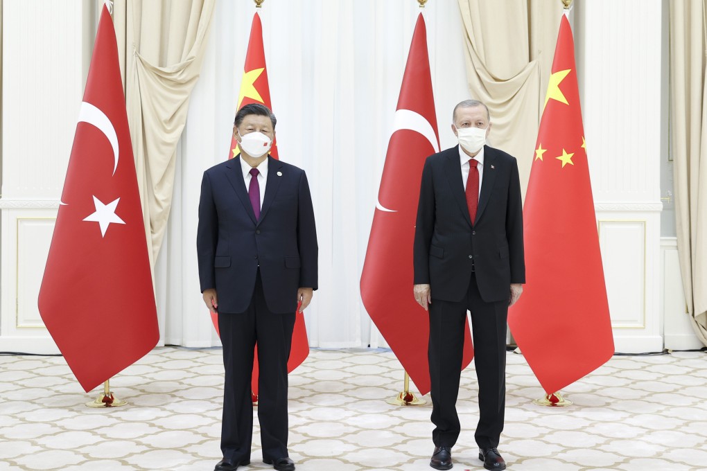Chinese President Xi Jinping, left, and Turkish President Recep Tayyip Erdogan meet on the sidelines of the Shanghai Cooperation Organisation (SCO) summit.
