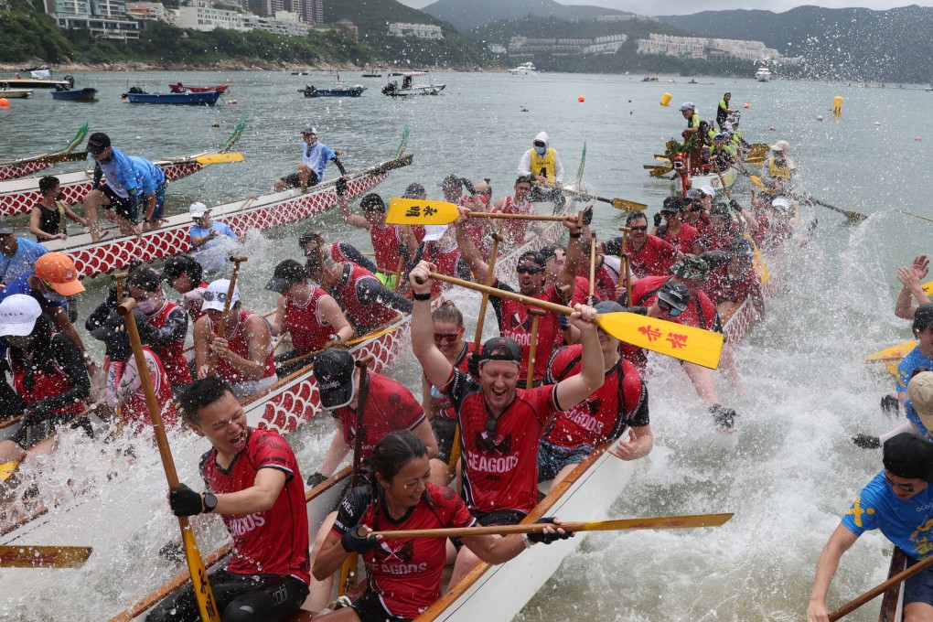 Dragon boat race crews celebrate in Stanley during the Chinese Dragon Boat Festival in June. Photo: Yik Yeung-man.