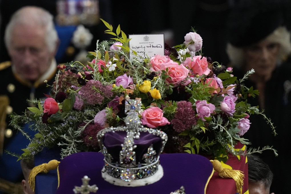 Britain’s King Charles follows the coffin of Queen Elizabeth as it is carried out of Westminster Abbey. Photo: AP