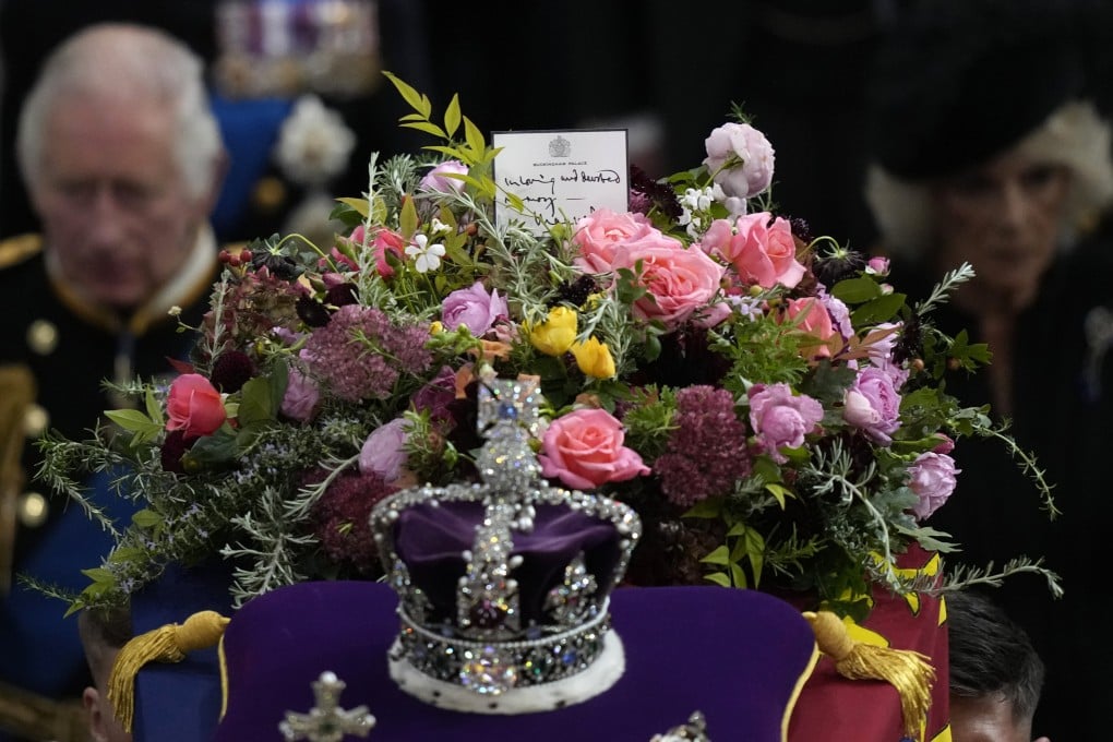 Britain’s King Charles follows the coffin of Queen Elizabeth as it is carried out of Westminster Abbey. Photo: AP