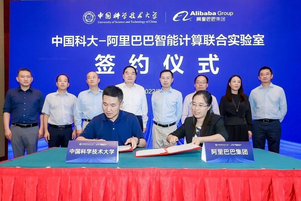 Representatives from the University of Science and Technology of China (left) and Alibaba take part in a signing ceremony to launch the AI Innovation Joint Lab. Photo: University of Science and Technology of China