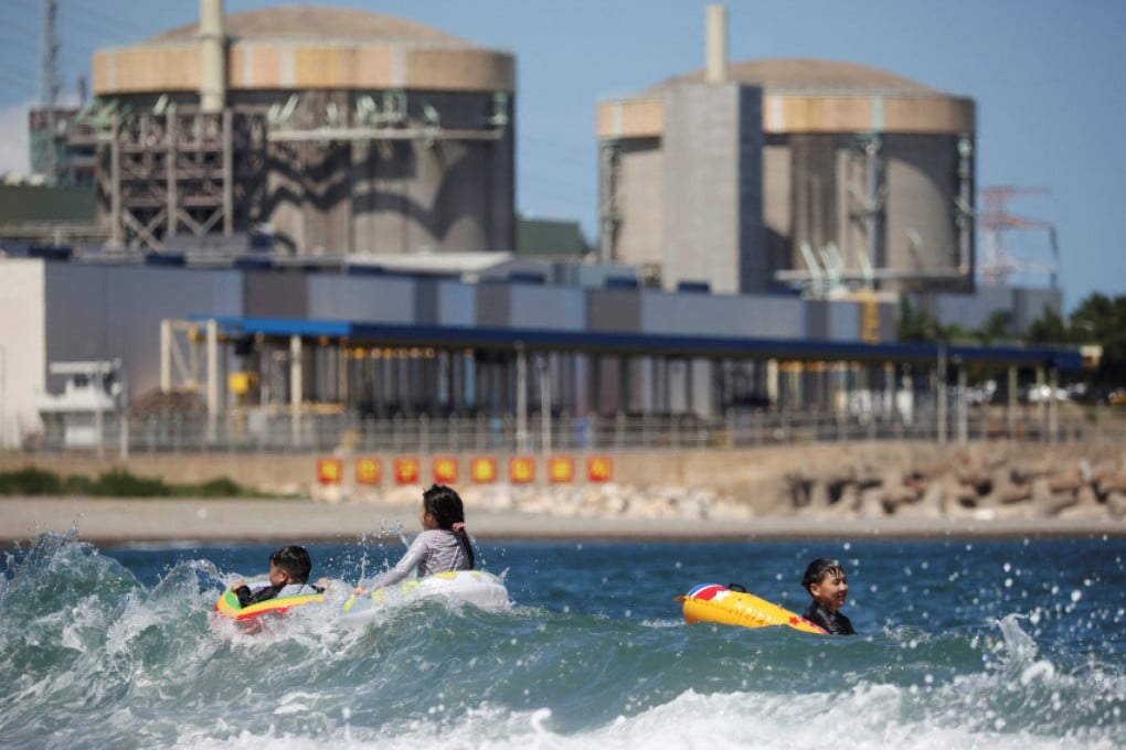 Children play in the ocean near Wolseong Nuclear Power Plant in Gyeongju, South Korea, on August 21. Energy is the top concern for businesses in Asia, with rising prices driving up costs for firms even as countries such as Japan and South Korea move to embrace nuclear power. Photo: Reuters