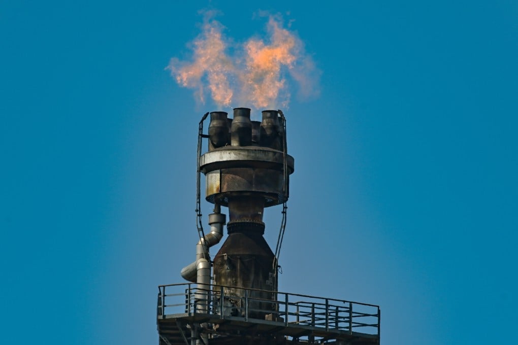 Surplus gas burns at the PCK Petroleum Refinery in Brandenburg, Schwedt, Germany on May 2. Last year, Rosneft took over a large part of the refinery which processes 12 million tonnes of crude oil annually, making it one of the largest processing sites in Germany. Photo: dpa