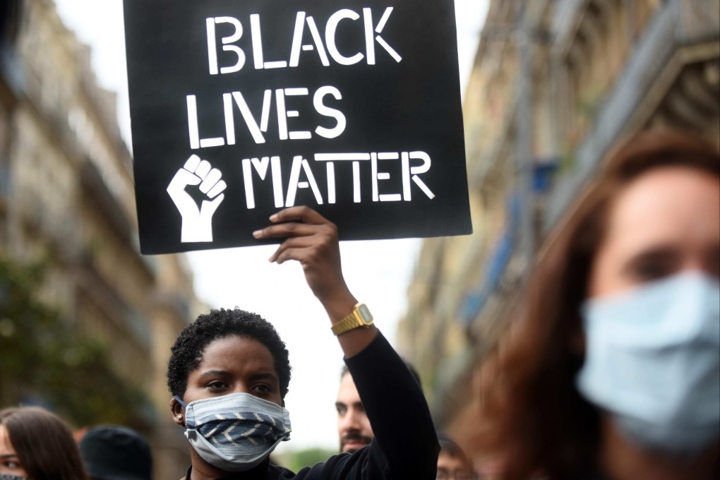 People take part in a protest against police violence in Toulouse, southern France. File photo: AFP