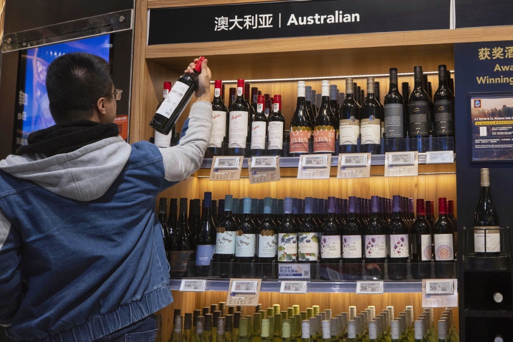 A man shops Australian wine in Shanghai in 2020. Photo: EPA-EFE