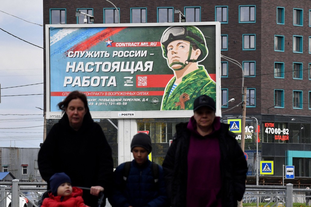 A military recruitment billboard in St Petersburg with the slogan “Serving Russia is a real job”. Photo: AFP