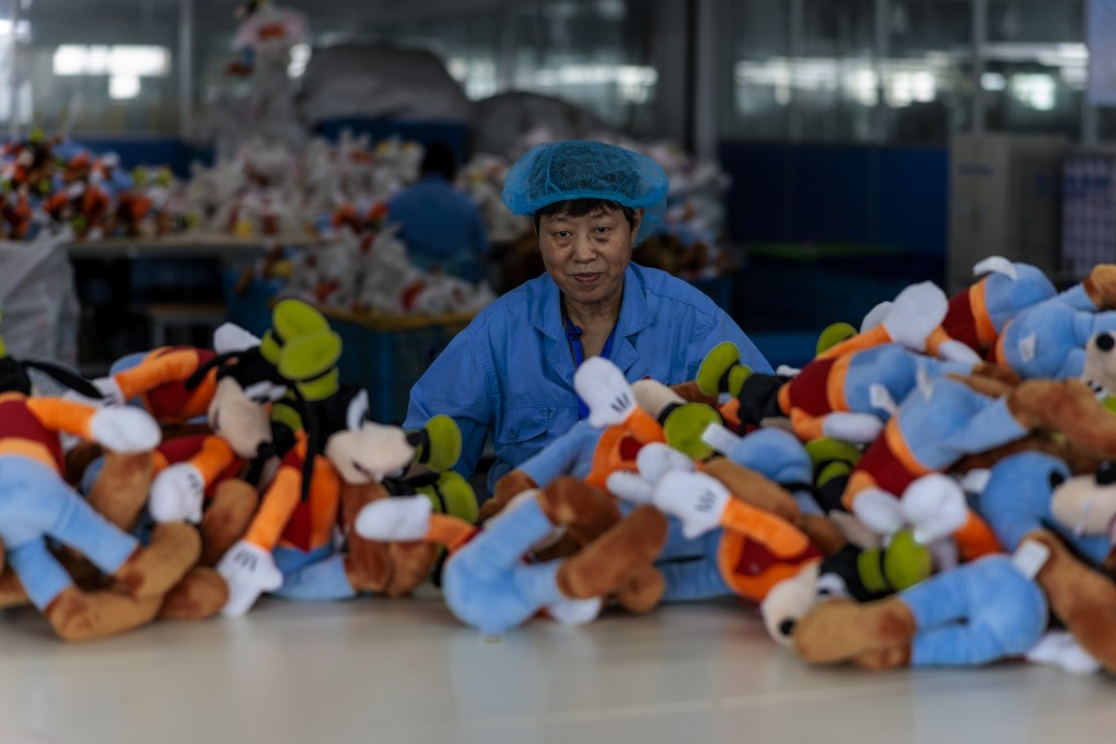 An employee works at a toy factory in Yangzhou, Jiangsu province. Export trade trade remains the most obvious channel through which weakening demand in the US and Europe can affect China. Photo: EPA-EFE