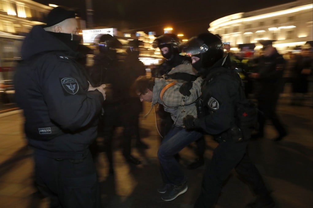 Russian policemen detain a protester in central St Petersburg on Wednesday. Photo: EPA-EFE