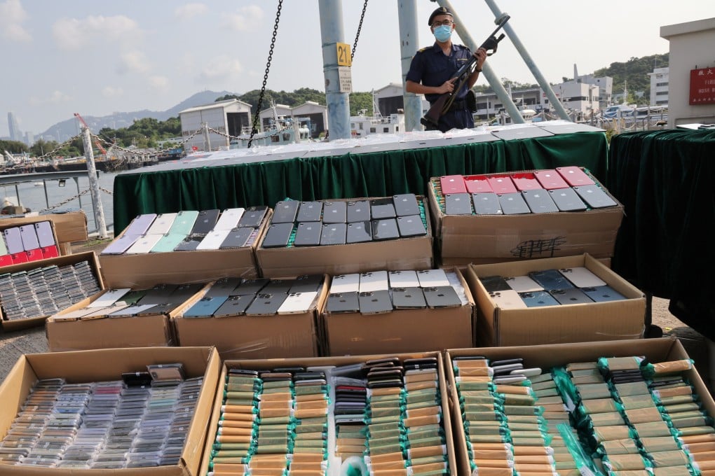 More than 16,000 Mark Six lottery tickets and electronic goods worth HK$10 million have been seized in an anti-smuggling operation. Photo: Jelly Tse