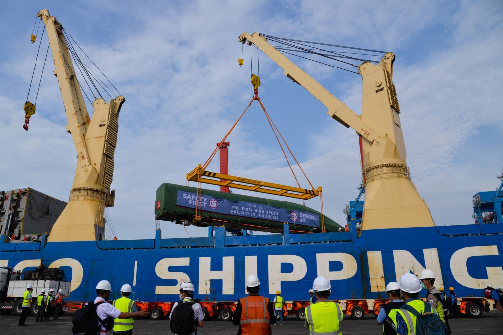 An electric passenger train, customized for the Jakarta-Bandung high-speed railway, being unloaded from a vessel in Tanjung Priok Port in Jakarta, Indonesia. Photo: Xinhua