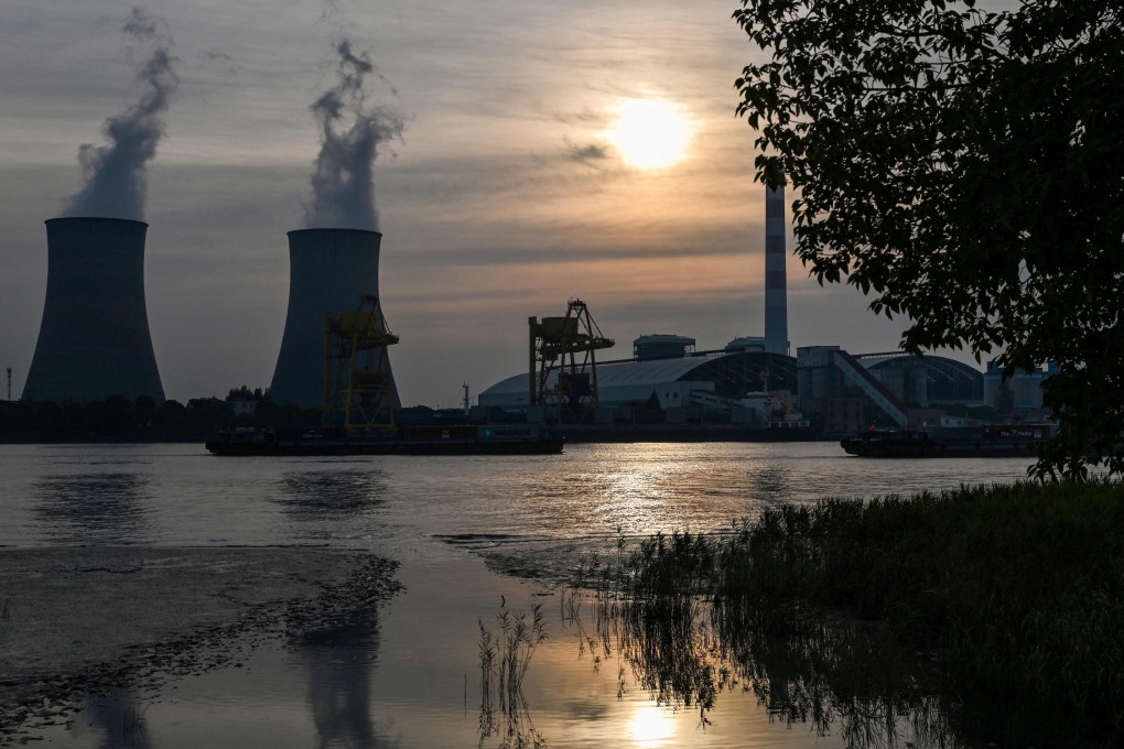 The Wujing coal power station is pictured across the Huangpu River, in the Minhang district of Shanghai, on August 22. China’s coal output hit record levels earlier this year. Photo: AFP
