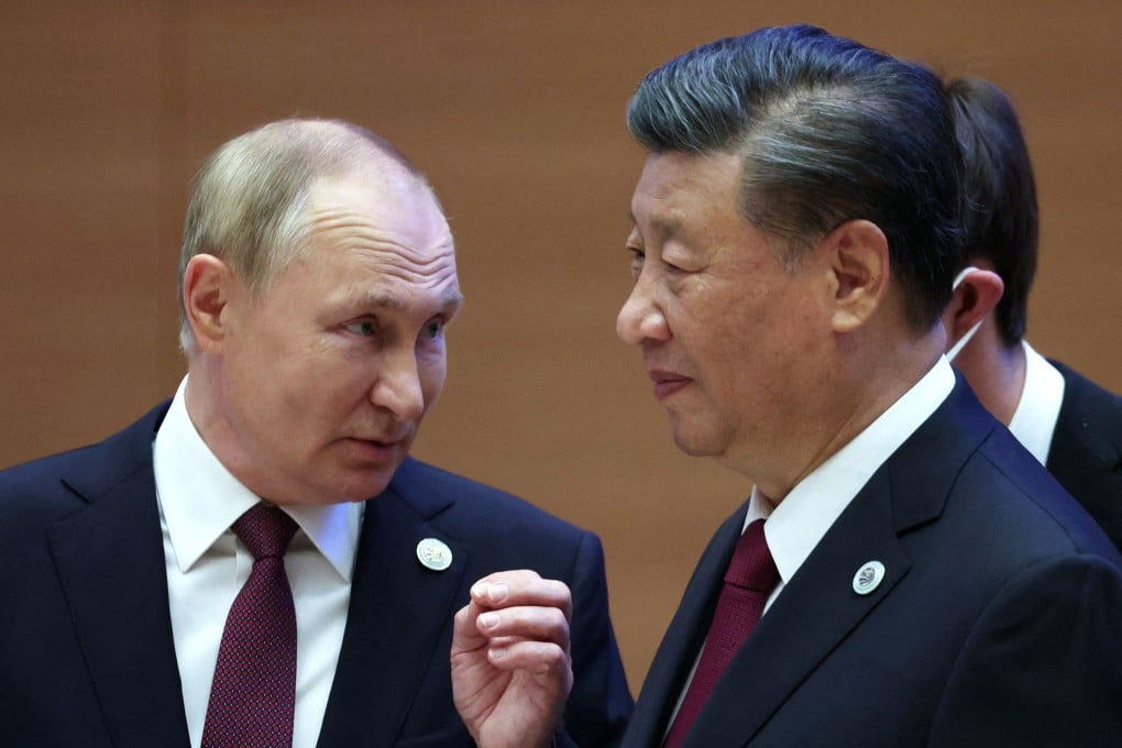 Russia’s Vladimir Putin speaks to Chinese President Xi Jinping during the SCO leaders’ summit in Samarkand on September 16. Photo: AFP via Getty Images