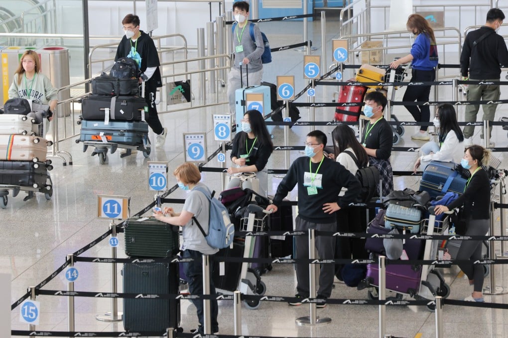 Passengers line up at a quarantine processing area in the arrivals hall at Hong Kong International Airport on Wednesday. Photo: Jelly Tse