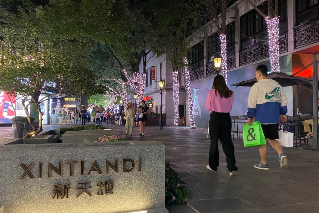 Young people walk past commercial compound Xintiandi in Shanghai on September 20, 2022. Photo: SCMP / Yaling Jiang