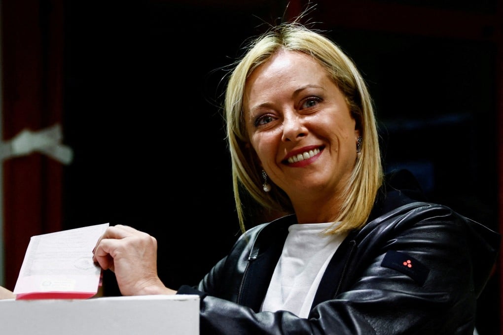 Leader of Brothers of Italy Giorgia Meloni poses with her ballot at a polling station in Rome. Photo: Reuters