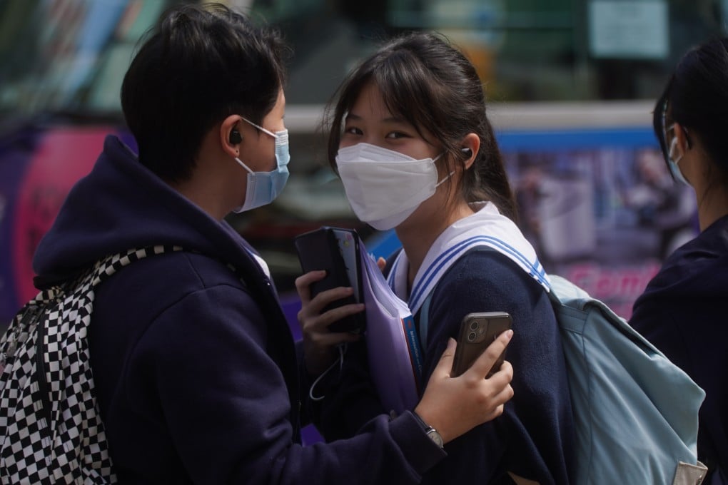 Secondary school students chat after school in Shek Kip Mei on January 20. Photo: Sam Tsang